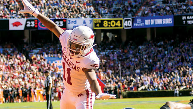 Arkansas Razorbacks defensive back Jaylon Braxton breaks up a pass intended Florida Gators wide receiver Kahleil Jackson.